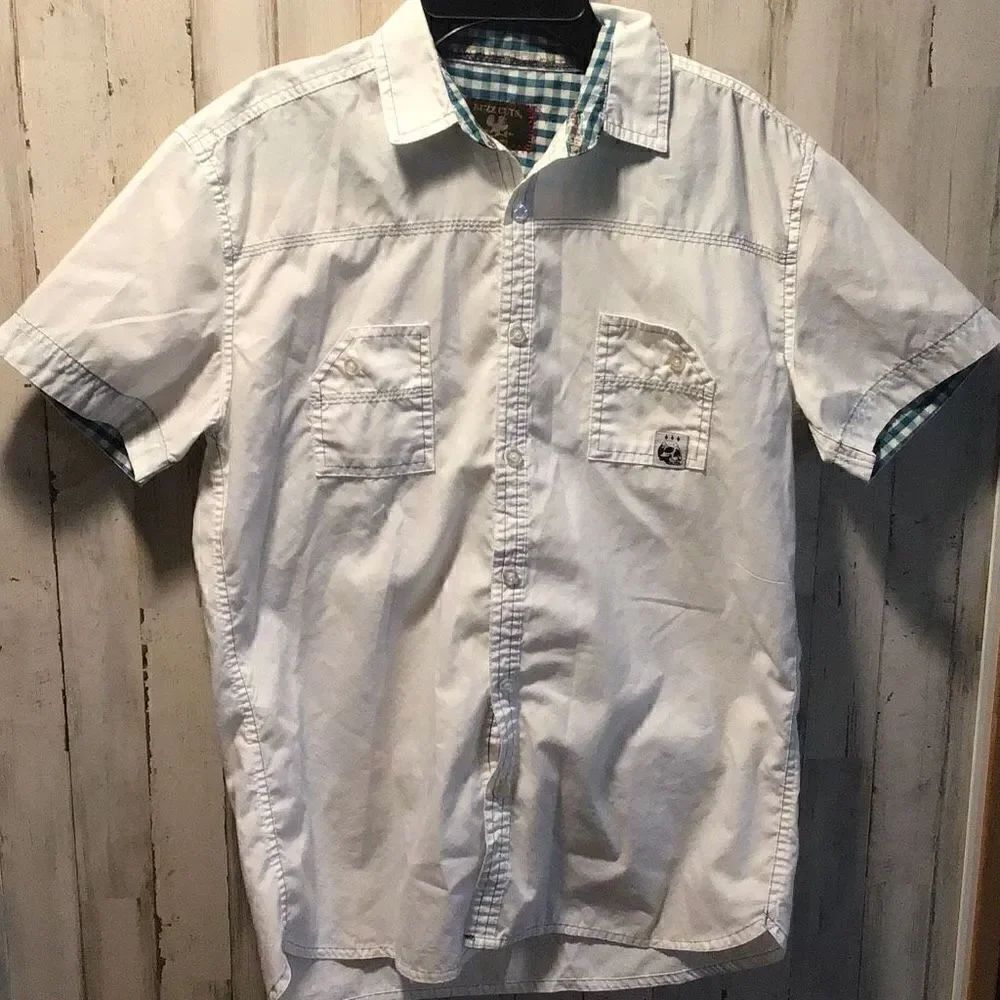 Shirt by Buzz Cuts youth Xl faint mark on back